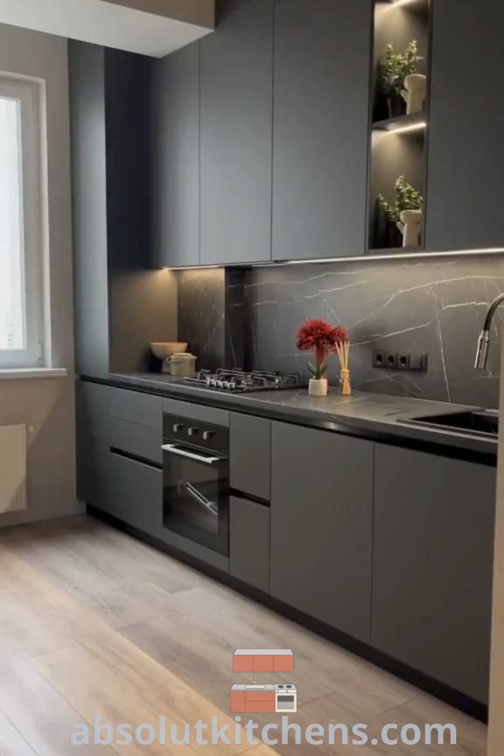 A modern kitchen featuring sleek gray cabinetry, innovative pantry designs, and the latest kitchen design ideas for a cozy home. This kitchen showcases functional and inspiring decor inspirations, offering unique ideas for your home. Discover more at wellnesswink.com.