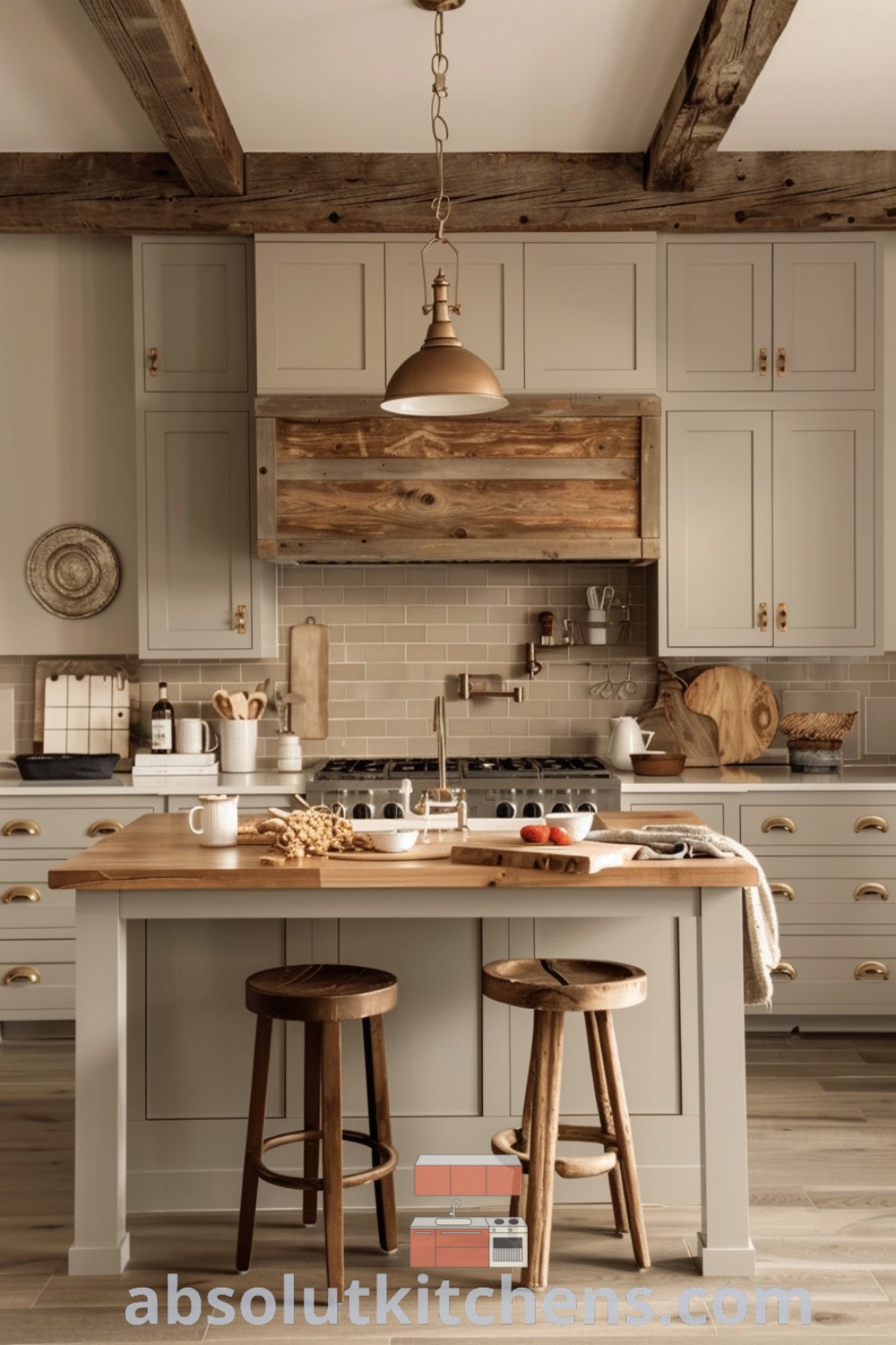 A cozy modern farmhouse kitchen with a rustic cream breakfast bar, two stools, and wooden beams, showcasing inspiring decor ideas for small spaces and kitchen peninsula designs. Discover more about modern farmhouse kitchen decor at absolutkitchens.com.