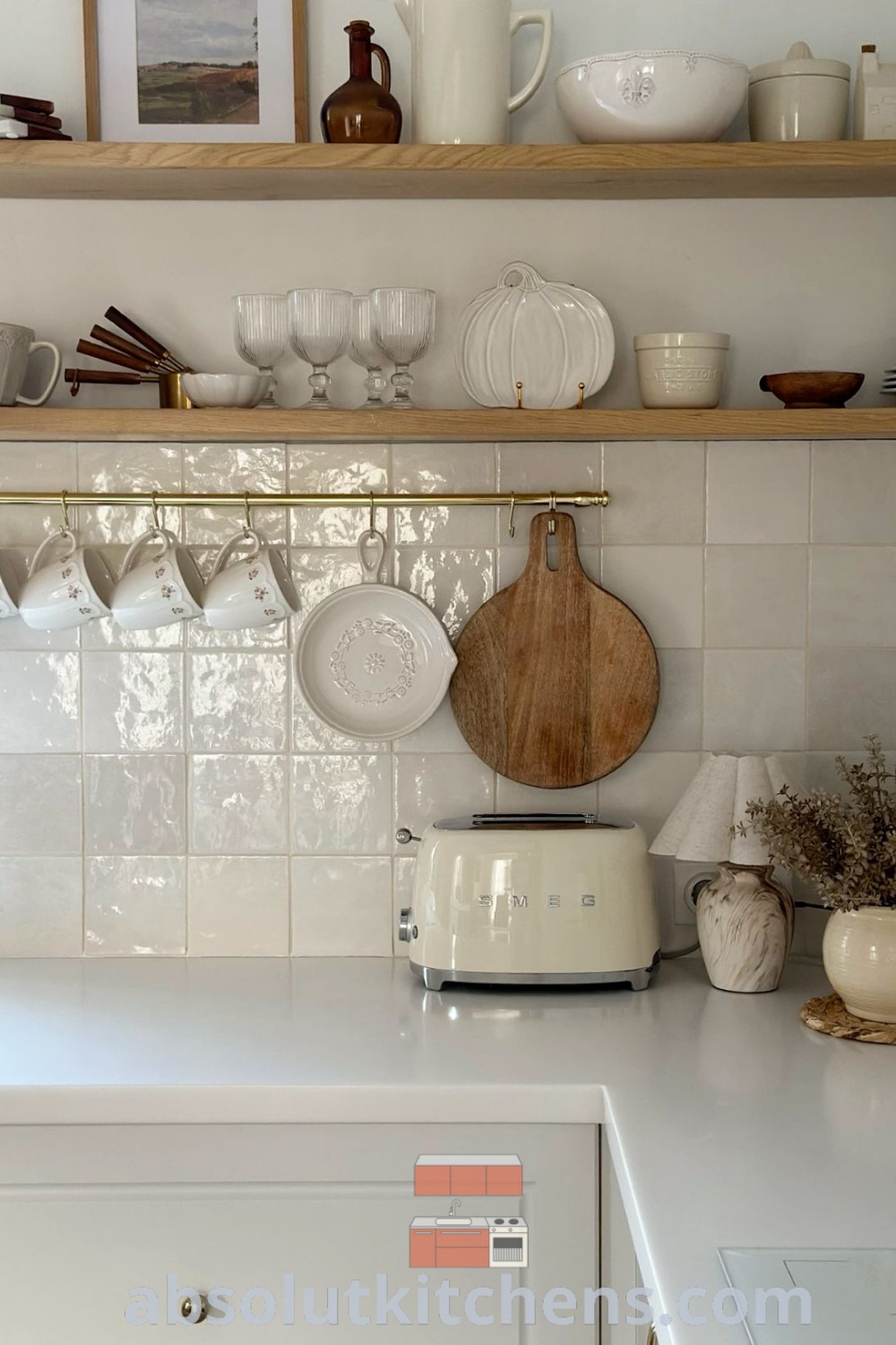 A clean kitchen counter ready for cooking or baking, featuring shelves styled with decor ideas from a 1920s Cottage and Craftsman Farmhouse. This cozy kitchen embodies inspiring decor inspirations for a warm and functional space. Discover unique ideas for your home at wellnesswink.com.