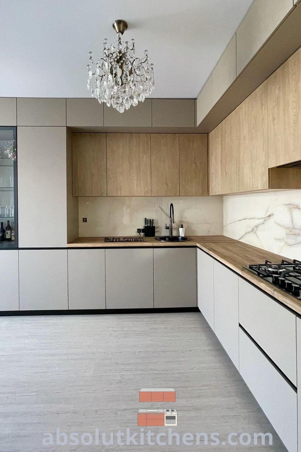 A clean and organized kitchen featuring sleek cabinets, minimal design elements, and inviting decor inspirations. This beautiful kitchen showcases practical kitchen organization ideas for maximizing space and comfort, offering unique design ideas for your home. Explore more on wellnesswink.com.