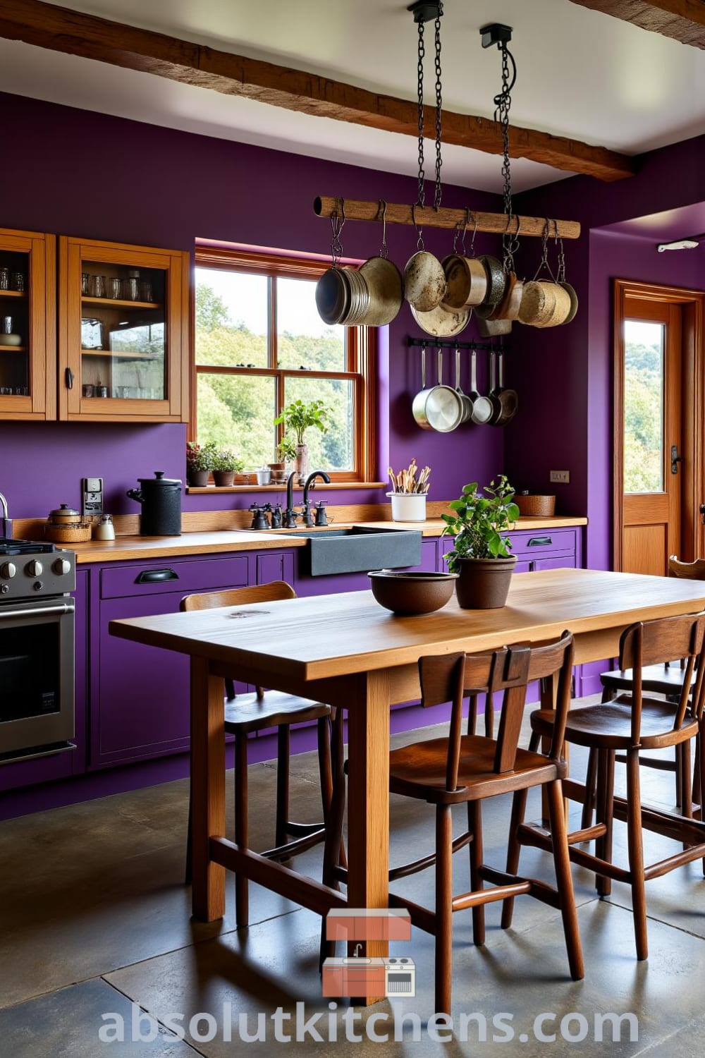 Cozy kitchen showcasing deep purple walls, wooden cabinetry, and a farmhouse table surrounded by mismatched chairs, with sunlight filtering through a window, creating a warm and inviting atmosphere, perfect for decor ideas and inspirations for your home; visit fireplacesandwoodstoves.com.