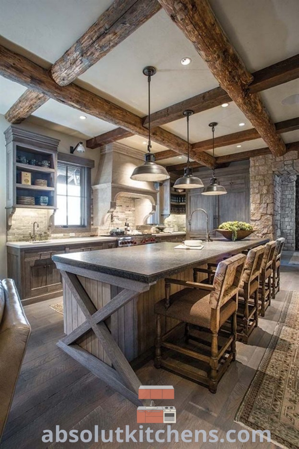 A large rustic kitchen with a central island and wooden beams offers functional and charming decor ideas for any home. This inspiring space showcases easy kitchen decor trends, rustic kitchen designs, and budget-friendly remodeling strategies, perfect for anyone seeking a cozy aesthetic. Explore more design tips and ideas at absolutkitchens.com.