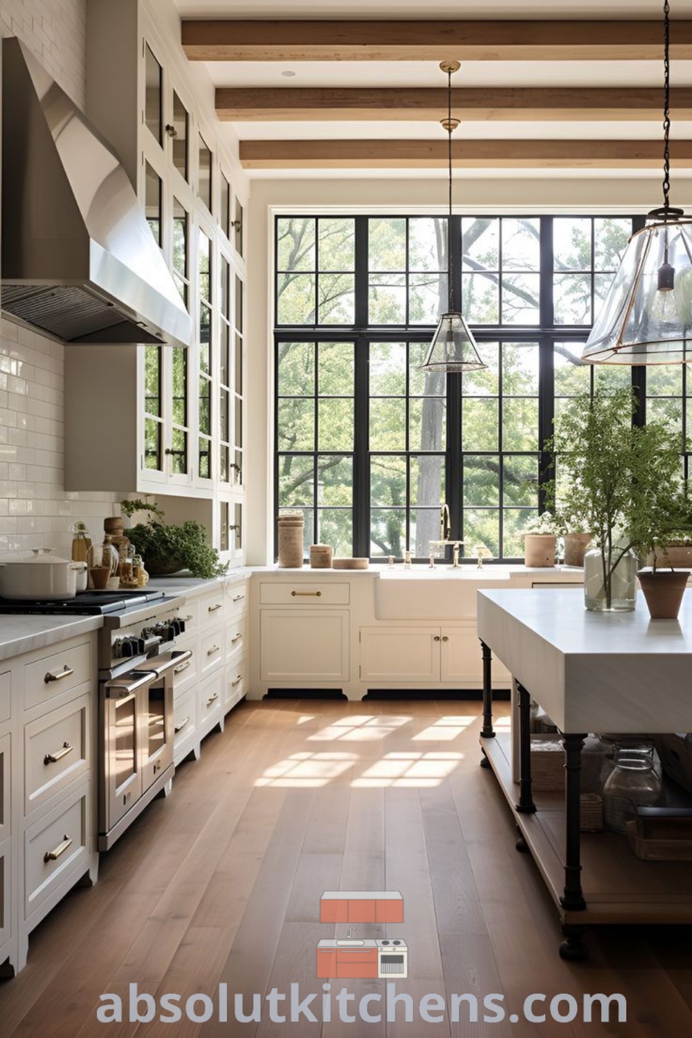 A large modern farmhouse kitchen featuring white cabinets and wood flooring, illuminated by ample natural light from large windows. This inviting space offers design tips for creating a cozy aesthetic with inspiring decor ideas and modern farmhouse hacks for your house or apartment. Find unique kitchen inspiration at absolutkitchens.com.