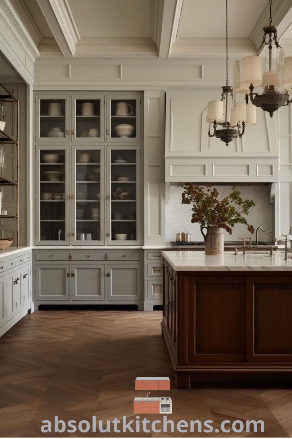 A large entertainment kitchen with white cabinets, wood flooring, and a spacious layout that emphasizes modern and traditional kitchen design. The image captures inspiring decor ideas for creating a cozy aesthetic, showcasing a large kitchen range hood and functionality, perfect for hosting gatherings. Explore more designs at absolutkitchens.com.