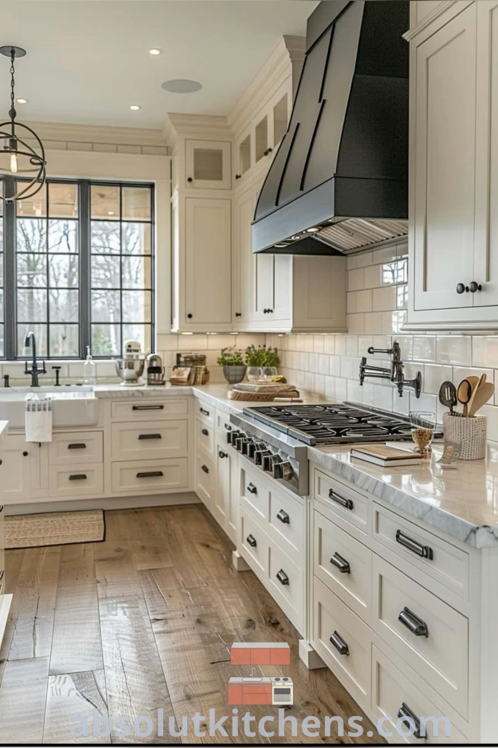 A large kitchen with white cabinets, wood floors, and built-in double ovens, showcasing a cozy aesthetic and functional design for cooking enthusiasts. This farmhouse kitchen layout offers inspiring ideas you need to see for house or apartment designs. Find more decor concepts at absolutkitchens.com.