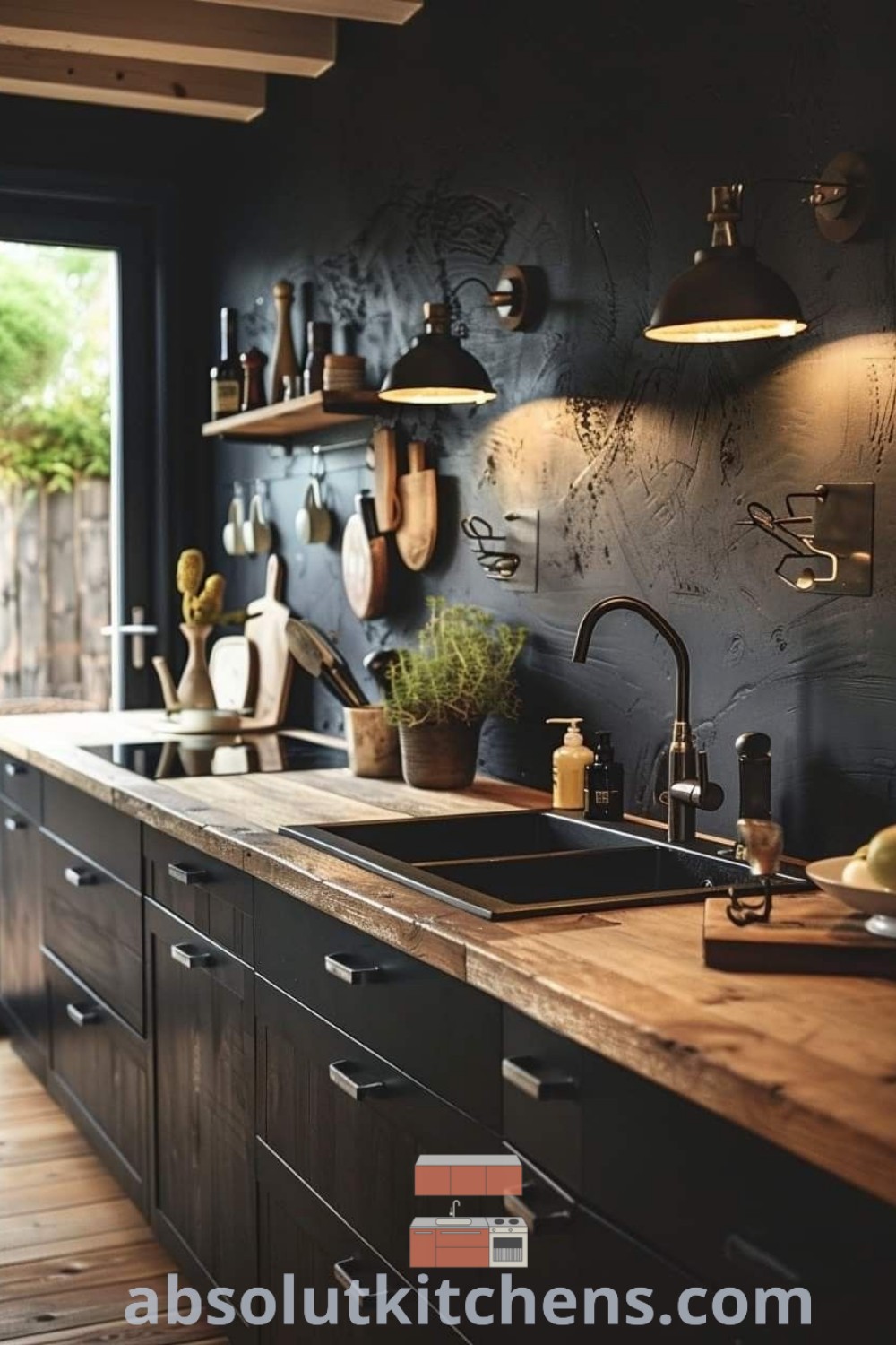 A cozy and stylish kitchen with black walls, wooden floors, black kitchen islands, and a brick wall, offering inspiring rustic industrial kitchen design ideas. Discover unique decor inspirations for your home at wellnesswink.com.