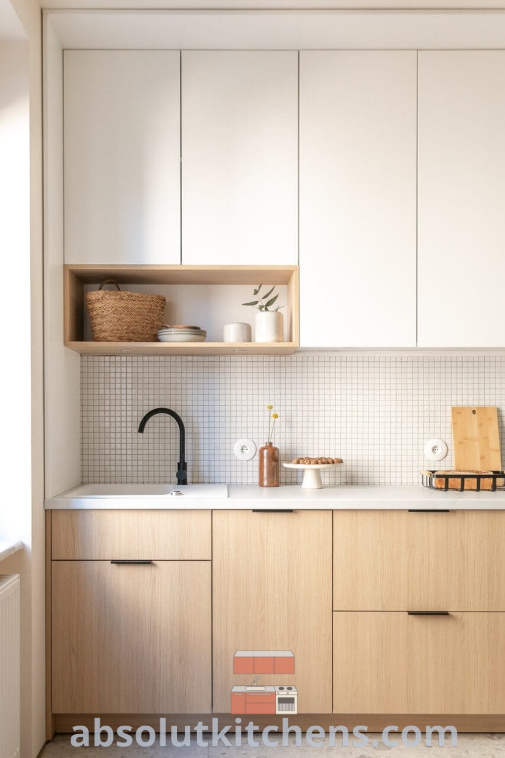 A clean and minimal Japandi style kitchen featuring Scandinavian design elements, showcasing a cozy and inviting atmosphere perfect for culinary creativity. The uncluttered space highlights unique ideas and decor inspirations suitable for any home. Discover more design ideas at wellnesswink.com.