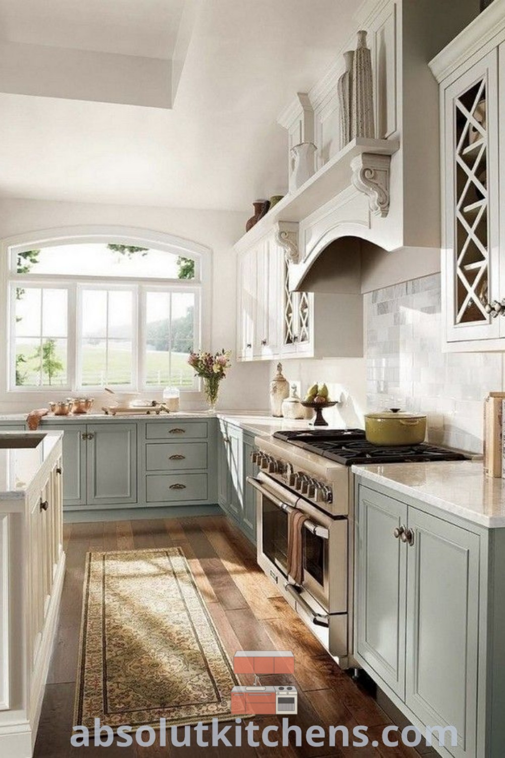 A cozy farmhouse kitchen with white and blue cabinets, showcasing a blend of modern kitchen cabinet design ideas and French country aesthetics. This inviting space offers inspiring decor ideas for small spaces and highlights the charm of country kitchens. Discover more design trends at absolutkitchens.com.