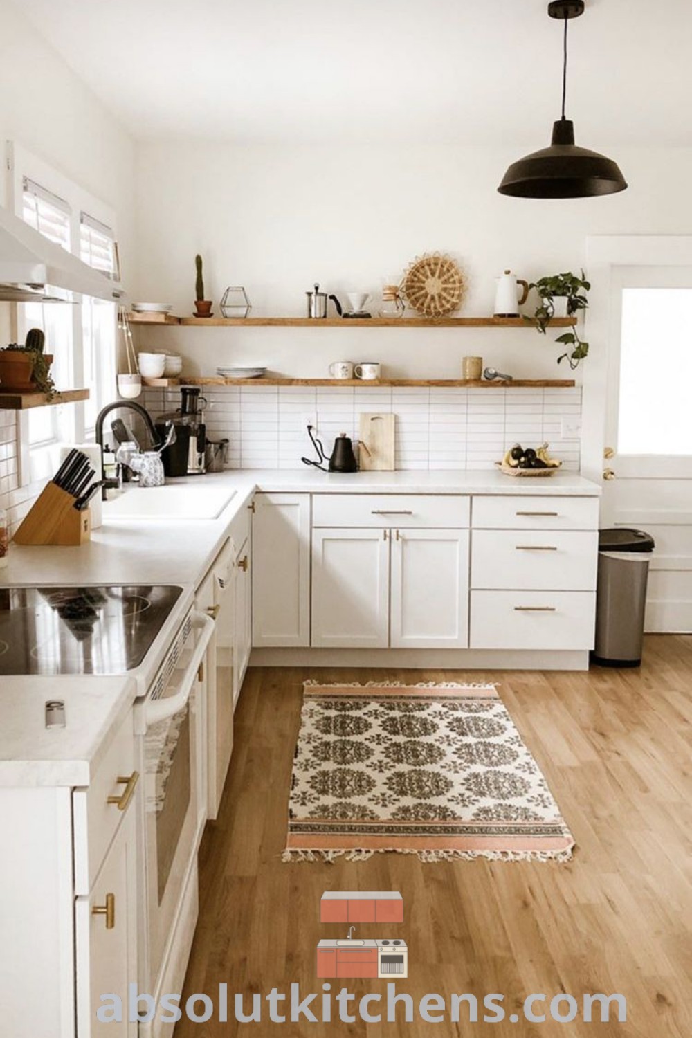 A clean and modern boho kitchen with white countertops, showcasing a cozy and inviting corner filled with unique decor ideas. This inspiring space features eco-friendly products and serves as a beautiful example of modern design ideas for your home. Discover more at wellnesswink.com.