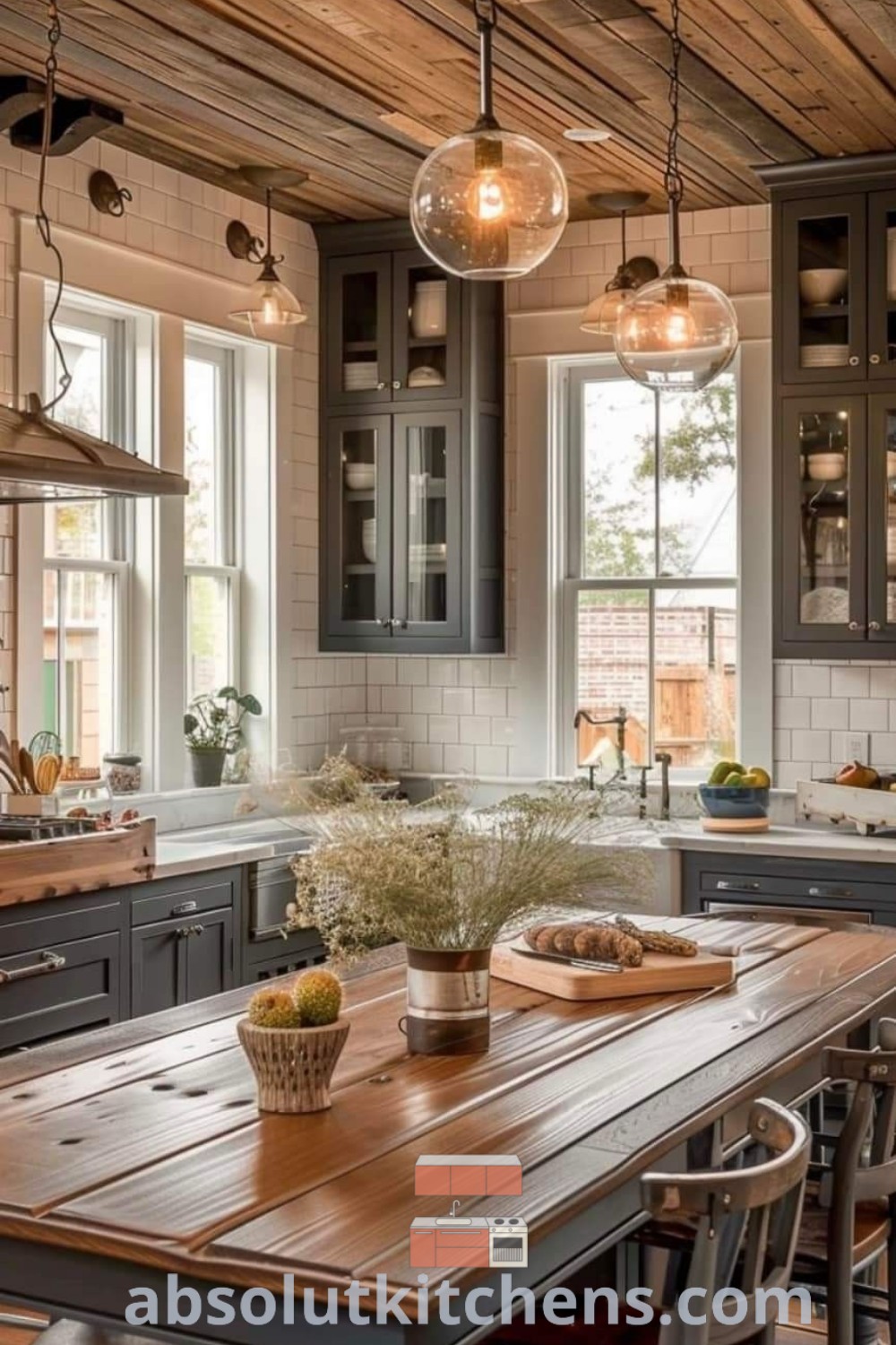 A rustic kitchen with wooden floors and a spacious 9 ft kitchen island surrounded by stools, capturing the essence of Australian farmhouse interior design. This decor offers creative dining area lighting ideas, enhancing the cozy aesthetic for house or apartment. Discover more inspiring tips and decor ideas at absolutkitchens.com.