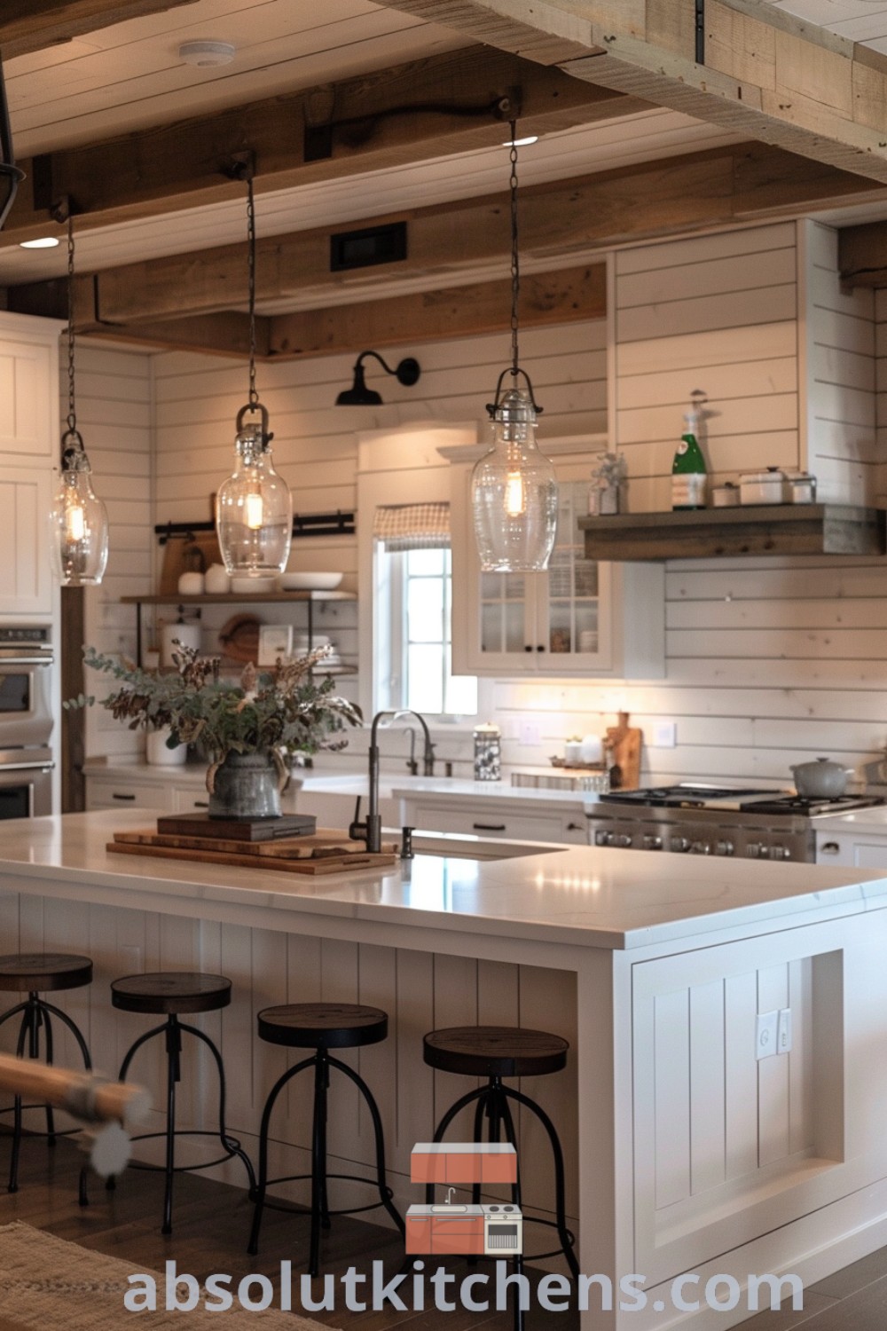 A rustic kitchen with an island and stools, showcasing farmhouse kitchen lights and modern farmhouse kitchen ideas. This light rustic decor creates a cozy and inviting aesthetic perfect for family gatherings. Explore more inspiring design trends and decor ideas for small spaces at absolutkitchens.com.