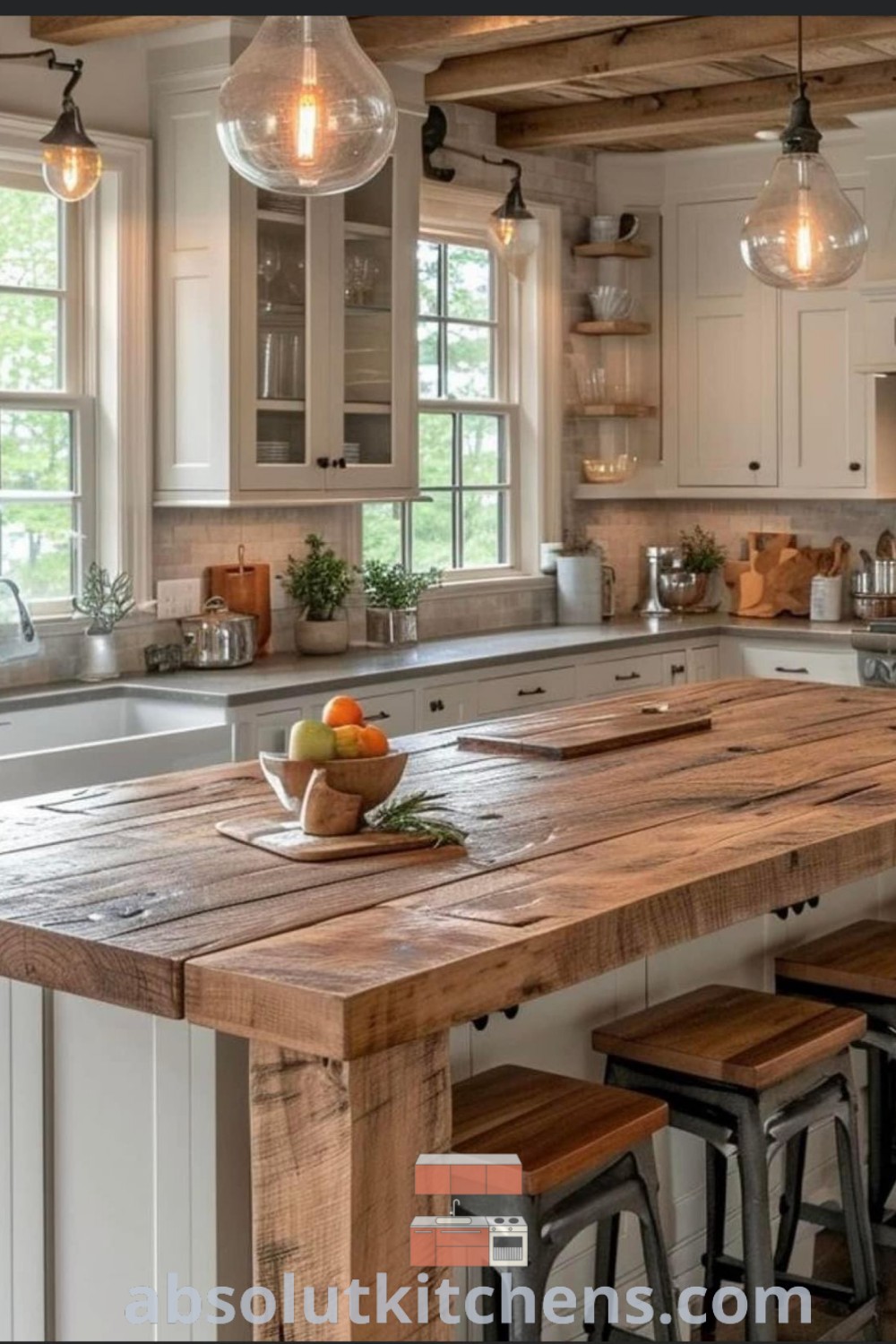 A beautiful rustic kitchen island showcases farmhouse kitchen design elements, blending functionality with aesthetic appeal. This cozy space is perfect for a kitchen remodel idea, offering country kitchens inspiration and modern farmhouse kitchens decor. Find more ideas you need to see at absolutkitchens.com.