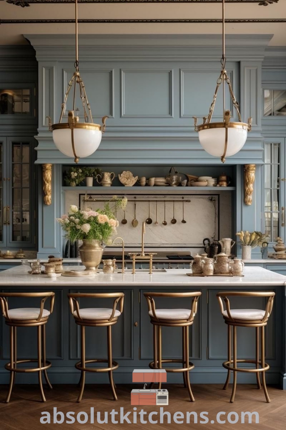 A glamorous traditional kitchen with blue cabinets, marble countertops, and gold chandeliers, showcasing design trends for inspiring decor ideas. This kitchen blends beauty and functionality, perfect for any home. Explore more design tips at absolutkitchens.com.