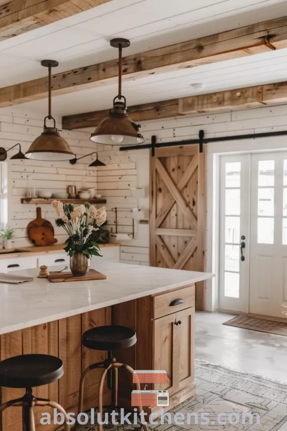 A cozy Western farmhouse kitchen with a rustic island, two stools, and an open door leading outside, ideal for gathering and relaxation. This space combines functional design trends with Western kitchen decor, providing inspiring ideas you need to see for your home. Explore more at absolutkitchens.com.