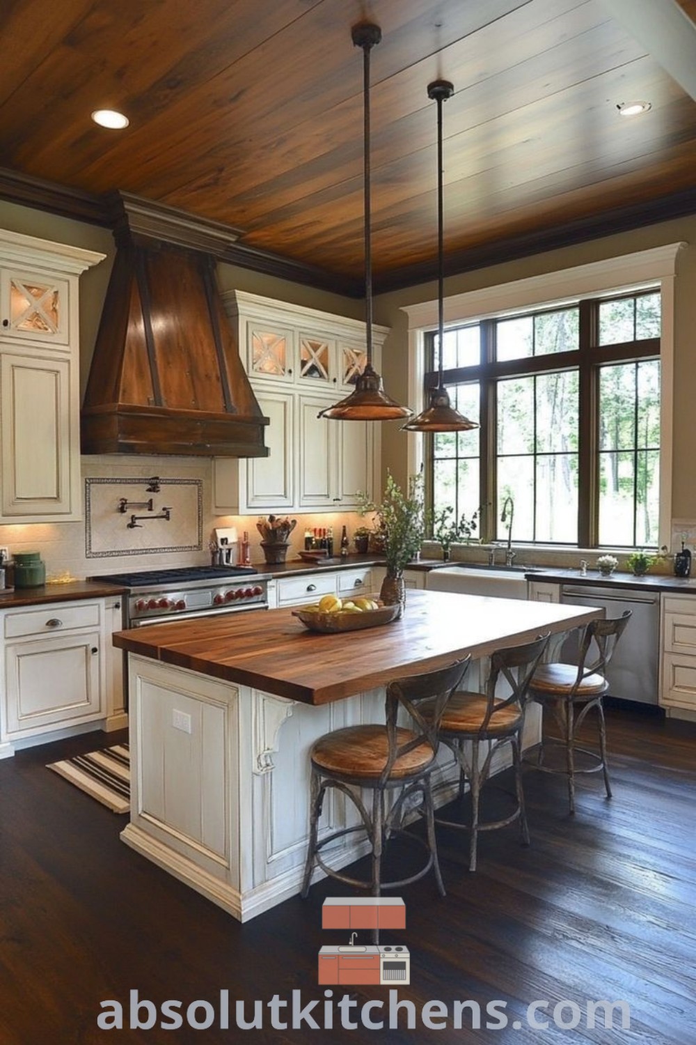 A large kitchen featuring a rustic butcher block island with wooden cabinets, wooden countertops, and two stools, showcasing inspiring country kitchen ideas. This cozy kitchen design enhances functionality while providing a warm atmosphere, making it ideal for house or apartment decor. Find more design trends at absolutkitchens.com.