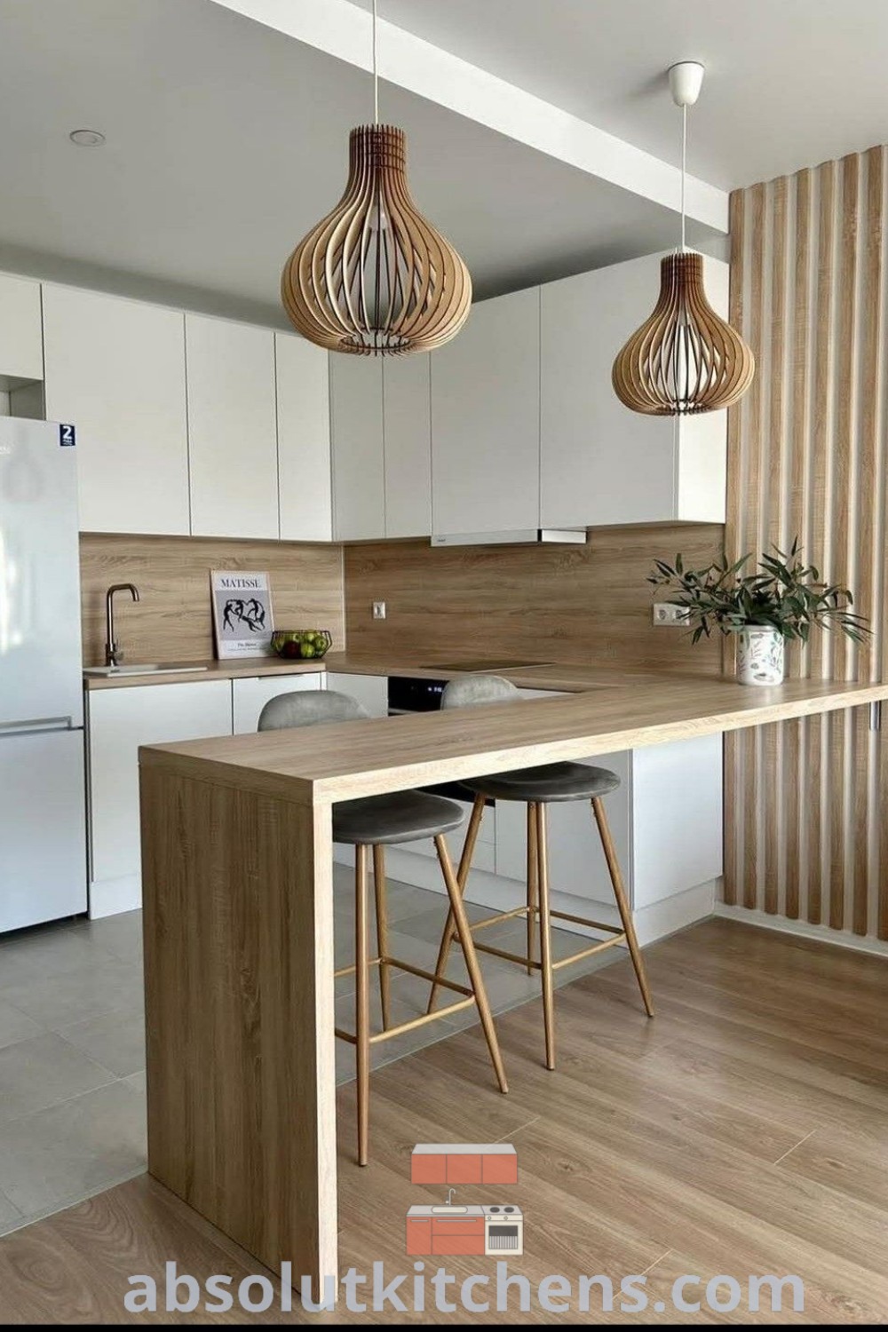 A modern European kitchen design featuring a clean, classic white aesthetic with sleek lines, showcasing decor inspirations and unique ideas for a cozy home. This space reflects contemporary kitchen ideas, perfect for those seeking dream kitchen designs. Explore more at wellnesswink.com.