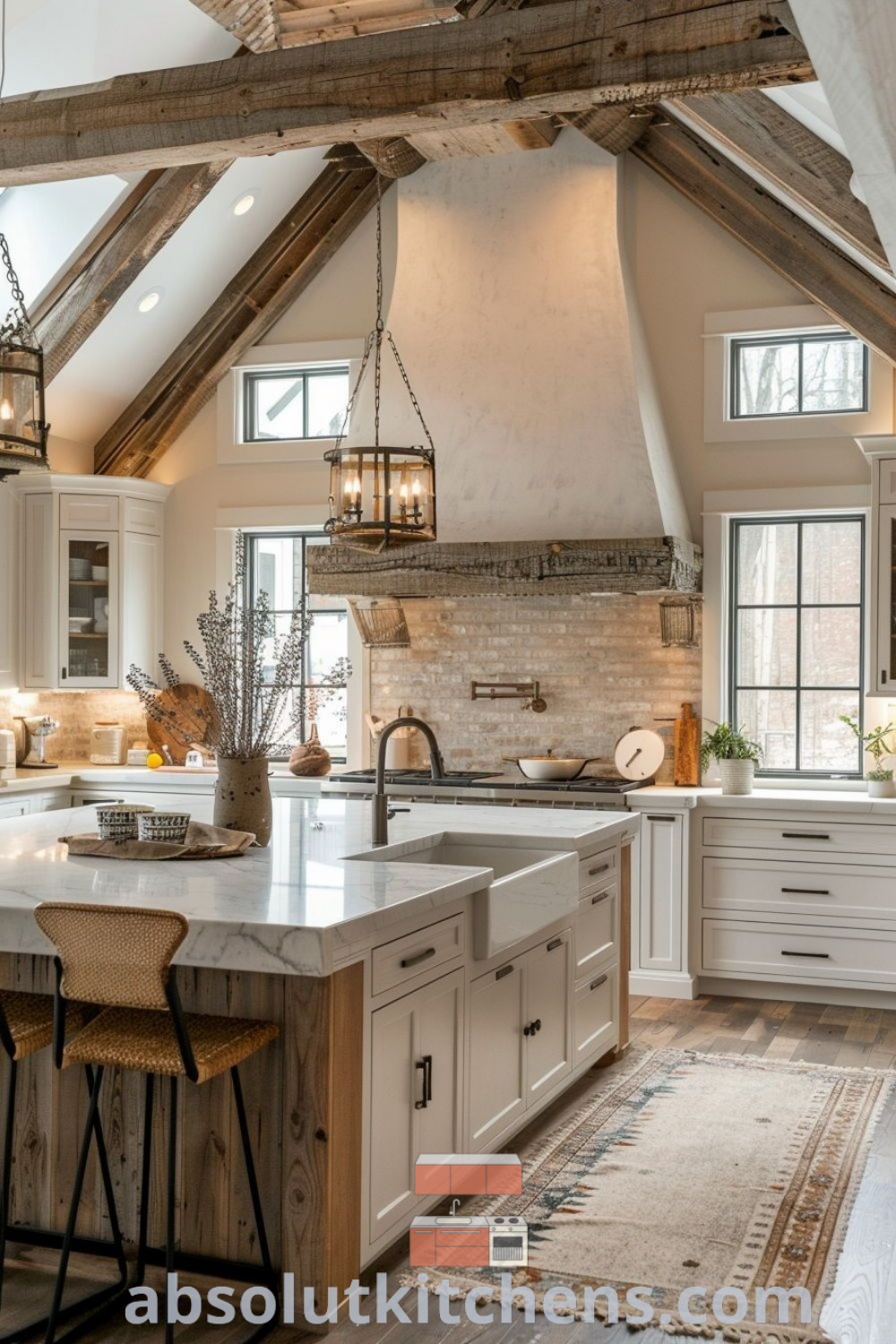 A large farmhouse kitchen featuring a central island, showcasing the best of modern country home designs. This cozy kitchen integrates decor ideas for a charming aesthetic, perfect for a farmhouse style interior. Explore more inspiring kitchen design trends at absolutkitchens.com.