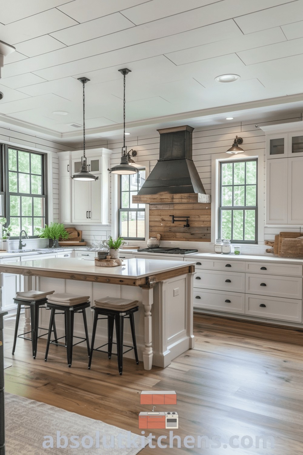 A large kitchen with white cabinets, rustic wood accents, and a shiplap backsplash, showcasing cozy farmhouse decor ideas for stylish home interiors. Explore design trends for kitchen renovations at absolutkitchens.com.
