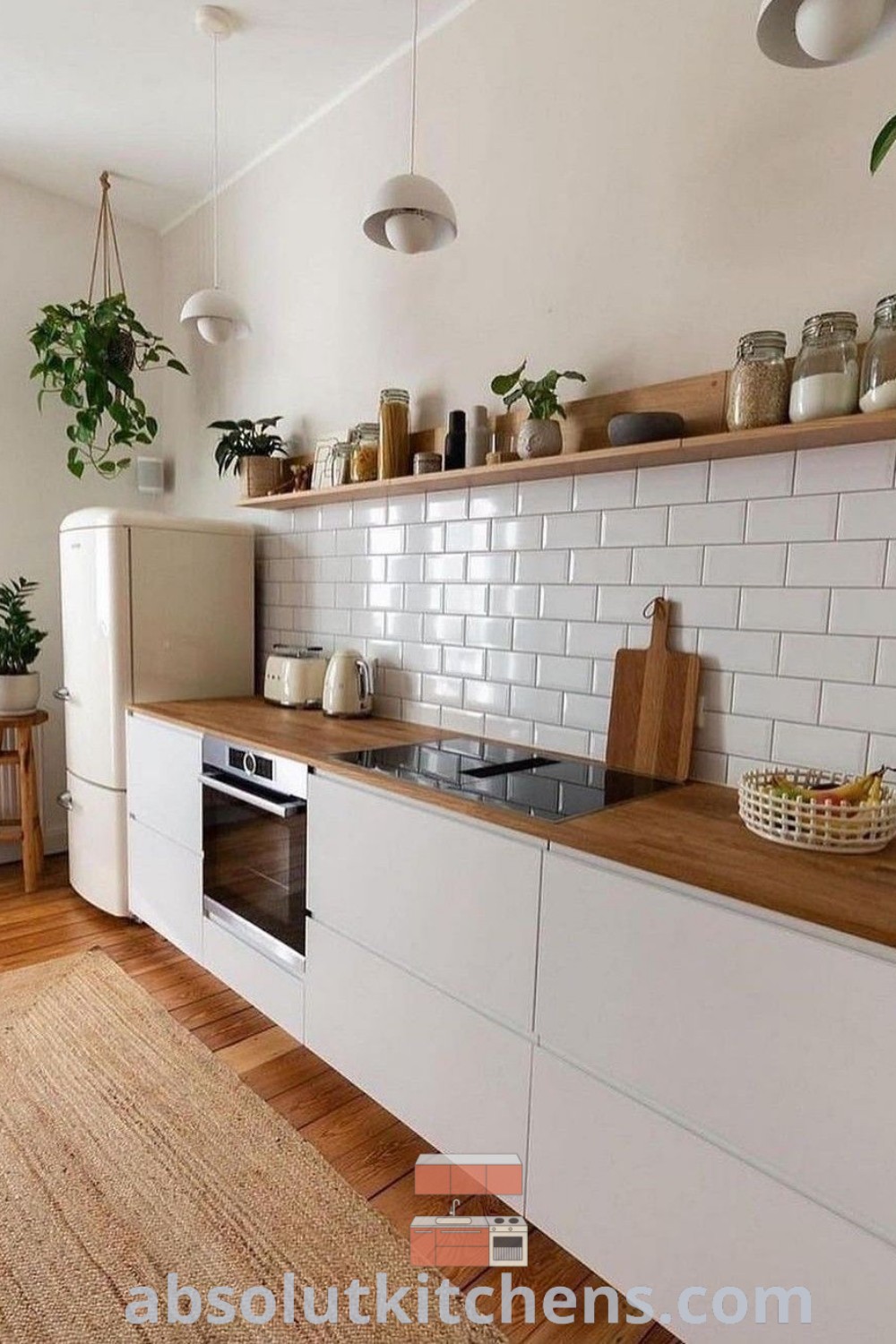 A clean and inviting kitchen featuring Scandinavian design ideas, minimal decor, and well-organized pantry laundry. This cozy kitchen space integrates interior plants for a fresh look, offering inspiring ideas for your home. Explore more design inspirations at wellnesswink.com.