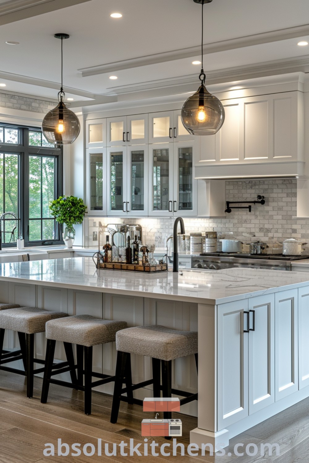 A large kitchen with white cabinets and marble countertops, featuring a spacious island with four stools, exemplifying modern design trends. This kitchen showcases inspiring ideas you need to see for house or apartment decor, providing cozy aesthetic tips and decorating ideas for a perfect cooking space. Visit absolutkitchens.com for more inspiration.